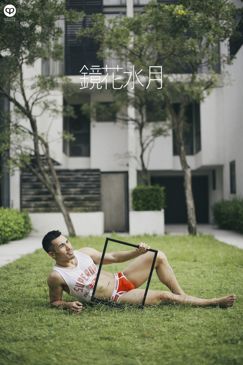 asian male creative portrait with mirror and trunks